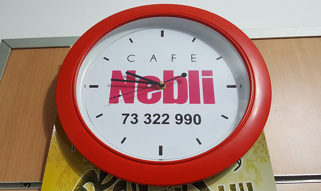 Montre murale publicitaire